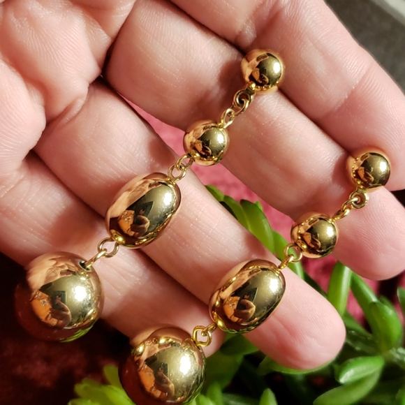 Vintage Jewelry - Vtg Shiny Graduated Golden Metal Bead Earrings